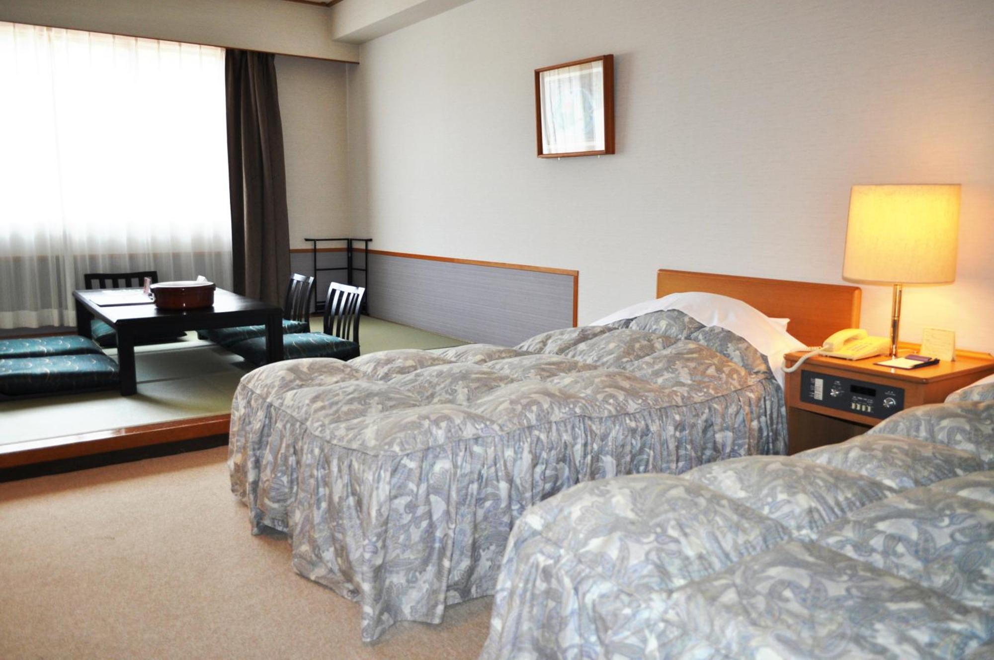 Tateyama Kokusai Hotel Тояма Номер фото