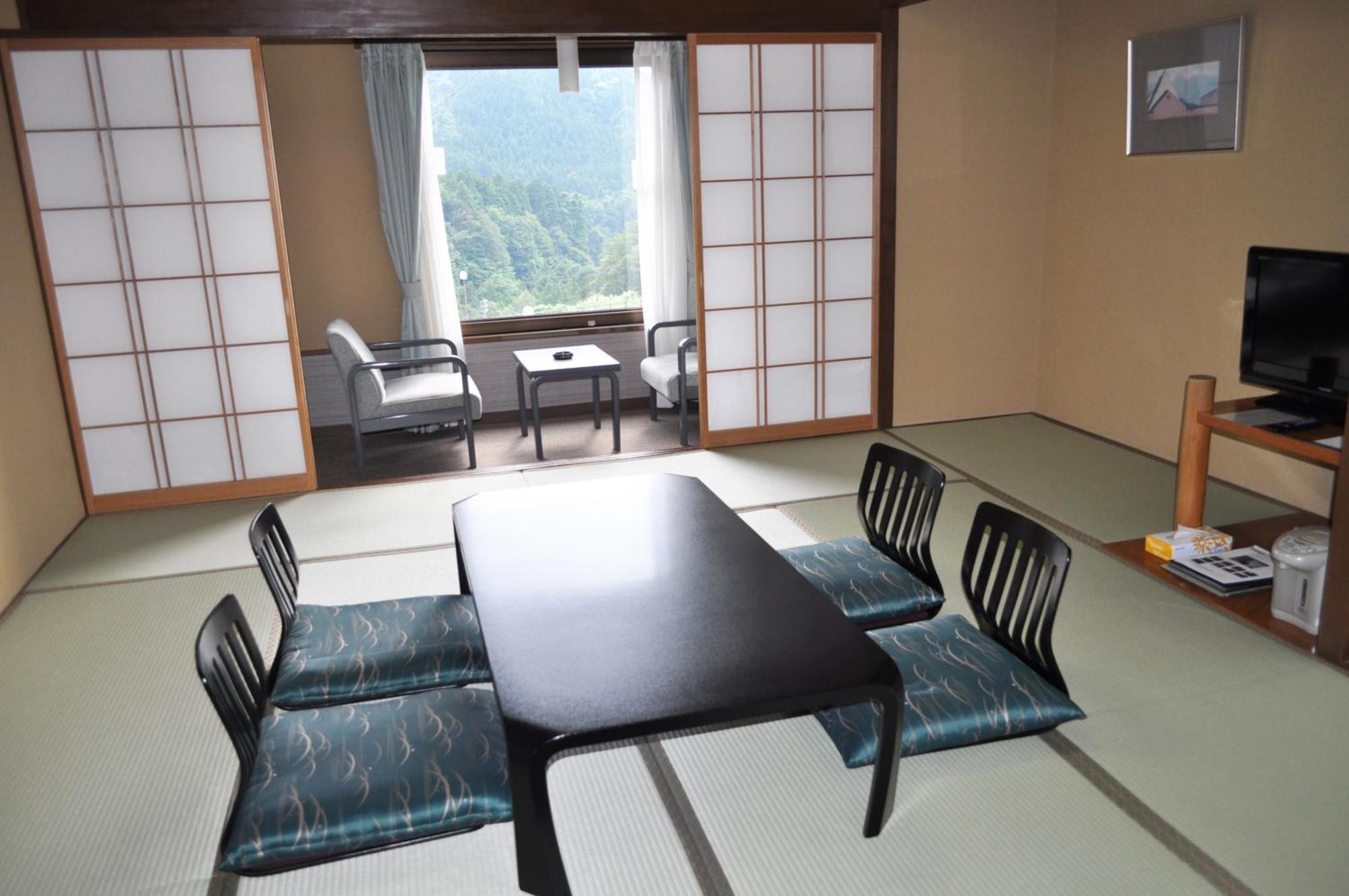 Tateyama Kokusai Hotel Тояма Номер фото